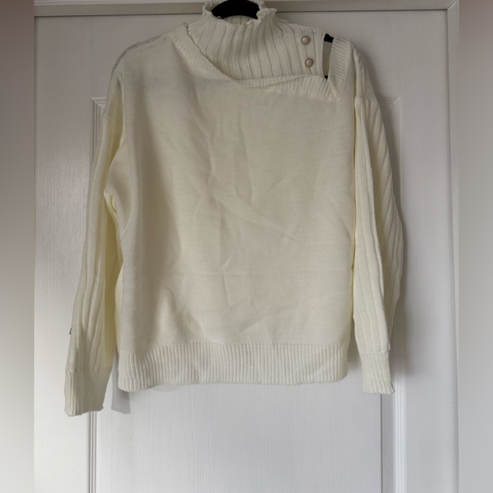 Off the shoulder, one side only (see photo) Cream colored long sleeve sweater
